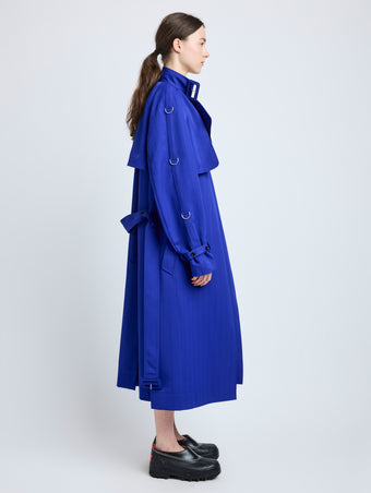 Proenza Schouler Side full length image of model wearing Sabina Coat in Technical Nylon Jacquard in Cobalt