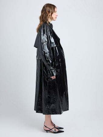Proenza Schouler Side full length image of model wearing Sabina Coat in Lacquered Leather in Black