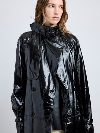 Proenza Schouler Detail image of model wearing Sabina Coat in Lacquered Leather in Black