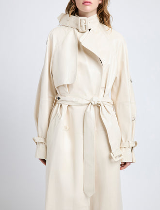 Proenza Schouler Detail image of model wearing Sabina Coat in Lacquered Leather in Ecru