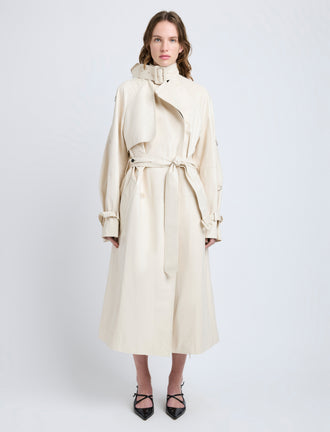 Proenza Schouler Front full length image of model wearing Sabina Coat in Lacquered Leather in Ecru
