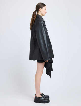Proenza Schouler Side full length image of model wearing Brice Jacket in Grainy Leather in Black