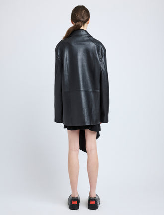 Proenza Schouler Back full length image of model wearing Brice Jacket in Grainy Leather in Black
