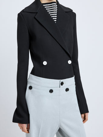 Proenza Schouler Detail image of model wearing Marine Jacket in Bi-Stretch Suiting in Black