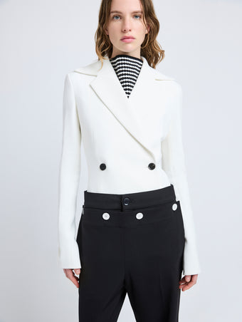 Proenza Schouler Detail image of model wearing Marine Jacket in Bi-Stretch Suiting in Off White