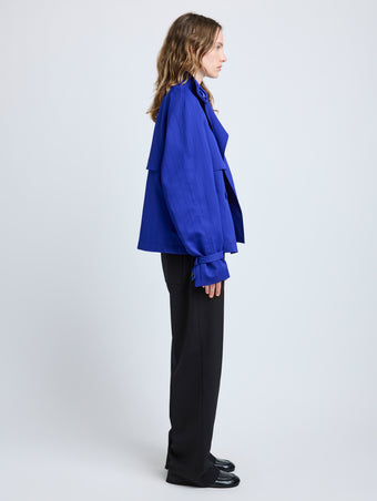 Proenza Schouler Side full length image of model wearing Larissa Jacket in Technical Nylon Jacquard in Cobalt
