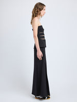 Proenza Schouler Side full length image of model wearing Kit Dress in Wool Gabardine in Black
