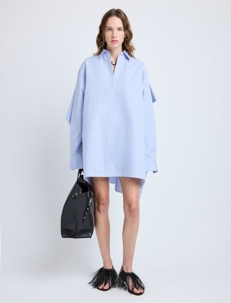Proenza Schouler Front full length image of model wearing Isla Dress in Stripe Cotton Silk Poplin in Pale Blue Multi