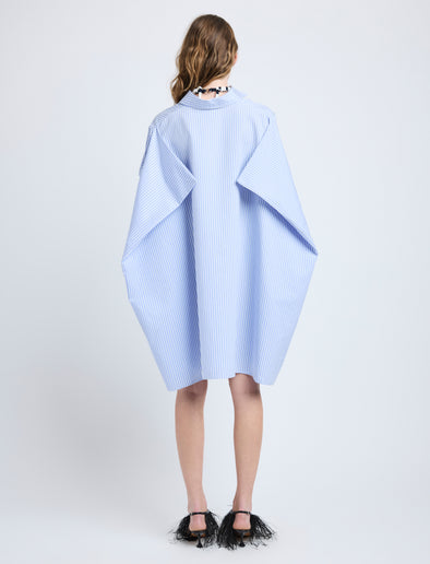 Proenza Schouler Back full length image of model wearing Isla Dress in Stripe Cotton Silk Poplin in Pale Blue Multi