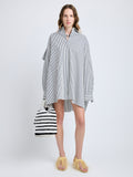 Proenza Schouler Front full length image of model wearing Isla Dress in Stripe Cotton Silk Poplin in Navy Multi