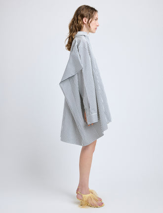 Proenza Schouler Side full length image of model wearing Isla Dress in Stripe Cotton Silk Poplin in Navy Multi