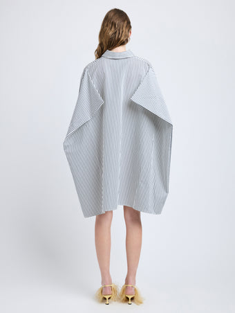 Proenza Schouler Back full length image of model wearing Isla Dress in Stripe Cotton Silk Poplin in Navy Multi