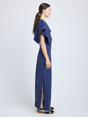 Proenza Schouler Side full length image of model wearing Selene Dress in Bi-Stretch Plaid Suiting in Cobalt Multi