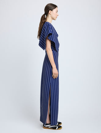 Proenza Schouler Side full length image of model wearing Selene Dress in Bi-Stretch Plaid Suiting in Cobalt Multi