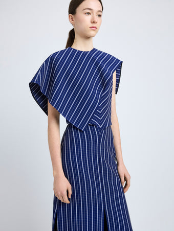 Proenza Schouler Detail image of model wearing Selene Dress in Bi-Stretch Plaid Suiting in Cobalt Multi
