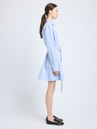 Proenza Schouler Side full length image of model wearing Viola Dress in Stripe Cotton Silk Poplin in Pale Blue Multi