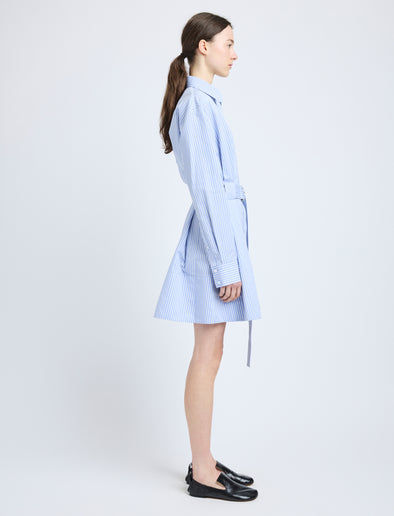 Proenza Schouler Side full length image of model wearing Viola Dress in Stripe Cotton Silk Poplin in Pale Blue Multi