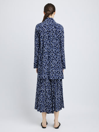 Proenza Schouler Back full length image of model wearing Emmeline Shirt in Printed Silk Viscose in Navy Multi