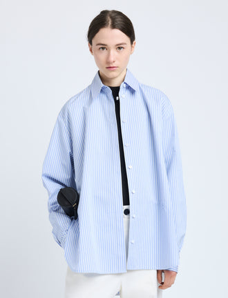 Proenza Schouler Front cropped image of model wearing Hunter Top in Stripe Cotton Silk Poplin in Pale Blue Multi