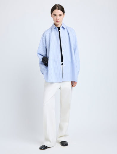 Proenza Schouler Front full length image of model wearing Hunter Top in Stripe Cotton Silk Poplin in Pale Blue Multi