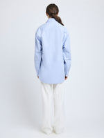 Proenza Schouler Back full length image of model wearing Hunter Top in Stripe Cotton Silk Poplin in Pale Blue Multi