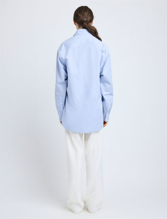 Proenza Schouler Back full length image of model wearing Hunter Top in Stripe Cotton Silk Poplin in Pale Blue Multi