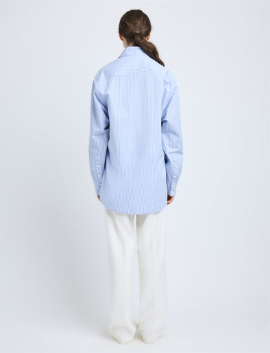 Proenza Schouler Back full length image of model wearing Hunter Top in Stripe Cotton Silk Poplin in Pale Blue Multi
