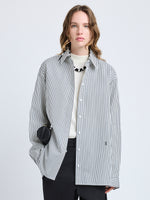 Proenza Schouler Front cropped image of model wearing Hunter Top in Stripe Cotton Silk Poplin in Navy Multi