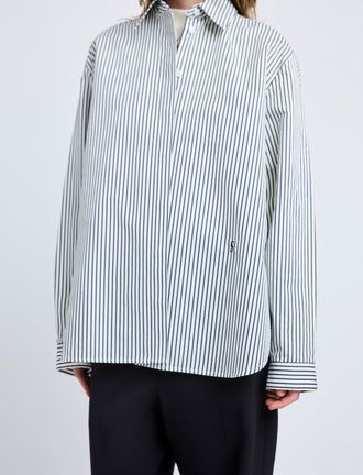 Proenza Schouler Detail image of model wearing Hunter Top in Stripe Cotton Silk Poplin in Navy Multi