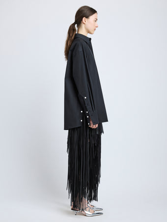 Proenza Schouler Side full length image of model wearing Addy Shirt in Compact Cotton Poplin in Black