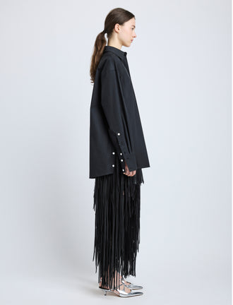 Proenza Schouler Side full length image of model wearing Addy Shirt in Compact Cotton Poplin in Black