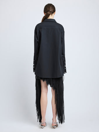 Proenza Schouler Back full length image of model wearing Addy Shirt in Compact Cotton Poplin in Black