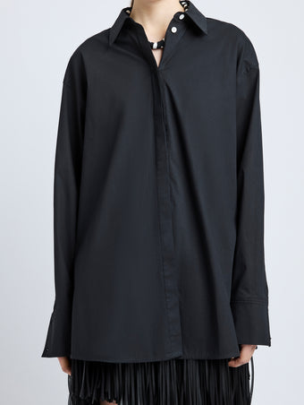 Proenza Schouler Detail image of model wearing Addy Shirt in Compact Cotton Poplin in Black