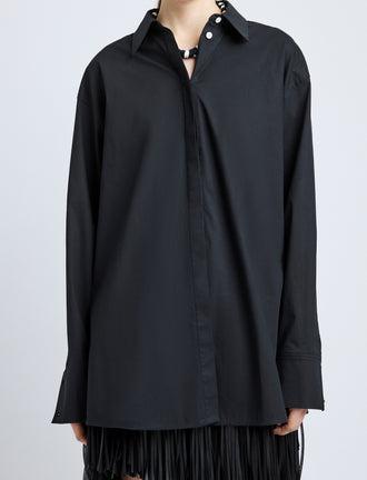 Proenza Schouler Detail image of model wearing Addy Shirt in Compact Cotton Poplin in Black