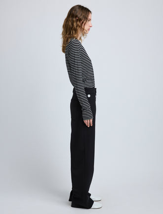 Proenza Schouler Side full length image of model wearing Mia T-Shirt in Cotton Stripe Jersey in Black Multi