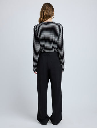 Proenza Schouler Back full length image of model wearing Mia T-Shirt in Cotton Stripe Jersey in Black Multi