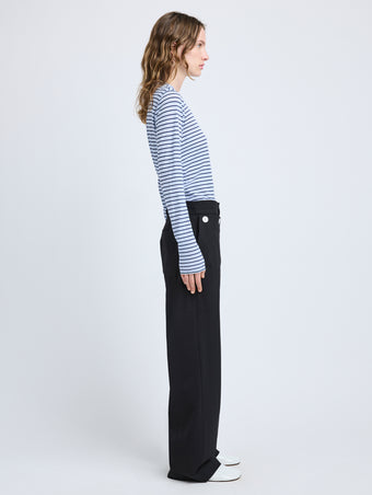 Proenza Schouler Side full length image of model wearing Mia T-Shirt in Cotton Stripe Jersey in Chambray Multi
