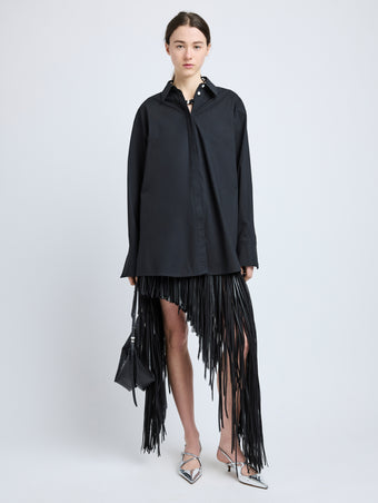 Proenza Schouler Front full length image of model wearing Phia Skirt in Leather Silk Fringe in Black