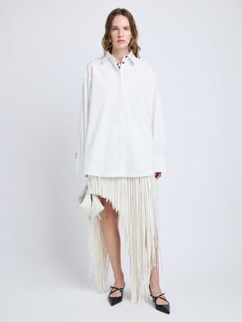 Proenza Schouler Front full length image of model wearing Phia Skirt in Leather Silk Fringe in Ecru