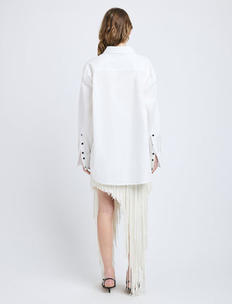 Proenza Schouler Back full length image of model wearing Phia Skirt in Leather Silk Fringe in Ecru