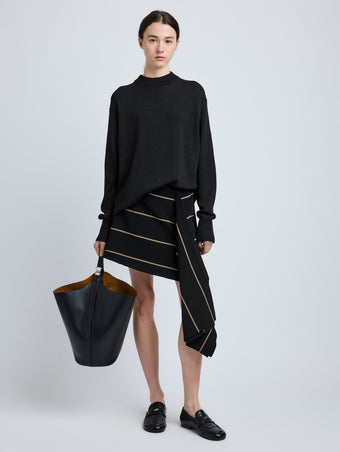Proenza Schouler Front full length image of model wearing Rae Skirt in Stripe Bi-Stretch Viscose in Black Multi