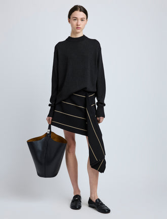 Proenza Schouler Front full length image of model wearing Rae Skirt in Stripe Bi-Stretch Viscose in Black Multi
