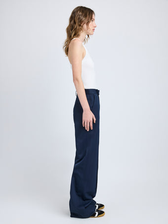 Proenza Schouler Side full length image of model wearing Weyes Pant in Technical Nylon Jacquard in Midnight