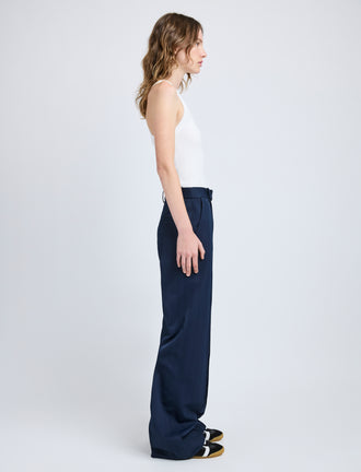 Proenza Schouler Side full length image of model wearing Weyes Pant in Technical Nylon Jacquard in Midnight