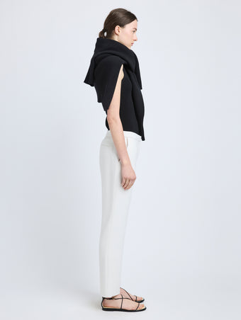Proenza Schouler Side full length image of model wearing Alexia Pant in Bi-Stretch Suiting in Off White