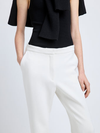 Proenza Schouler Detail image of model wearing Alexia Pant in Bi-Stretch Suiting in Off White