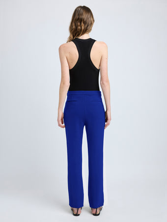 Proenza Schouler back image of model wearing Alexia Pant in Bi-Stretch Suiting in cobalt