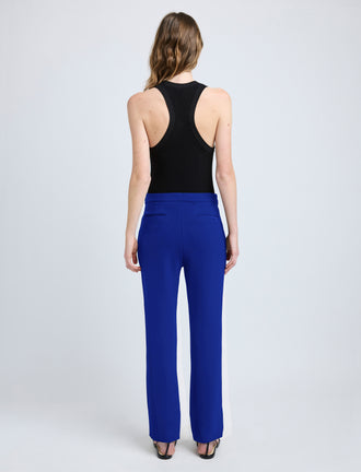 Proenza Schouler back image of model wearing Alexia Pant in Bi-Stretch Suiting in cobalt