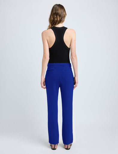 Proenza Schouler back image of model wearing Alexia Pant in Bi-Stretch Suiting in cobalt