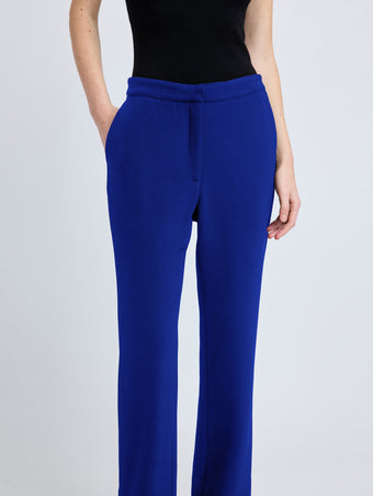 Proenza Schouler detail image of model wearing Alexia Pant in Bi-Stretch Suiting in cobalt